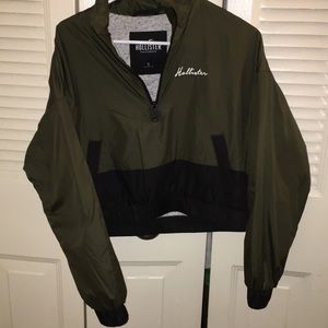 Olive green windbreaker jacket